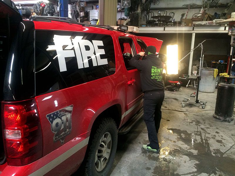 The Dent Guys - Paintless Dent Repair Professionals