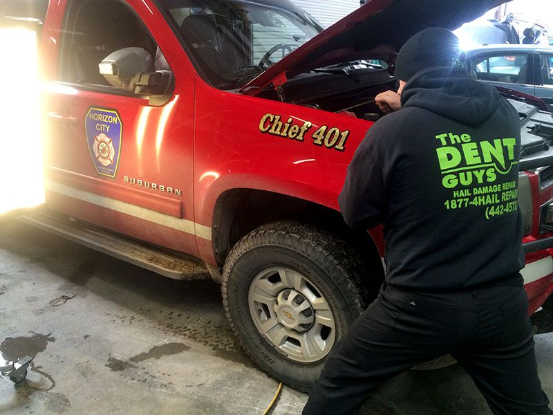 The Dent Guys - Paintless Dent Repair Professionals
