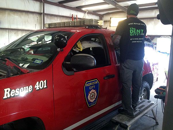 The Dent Guys - Paintless Dent Repair Professionals